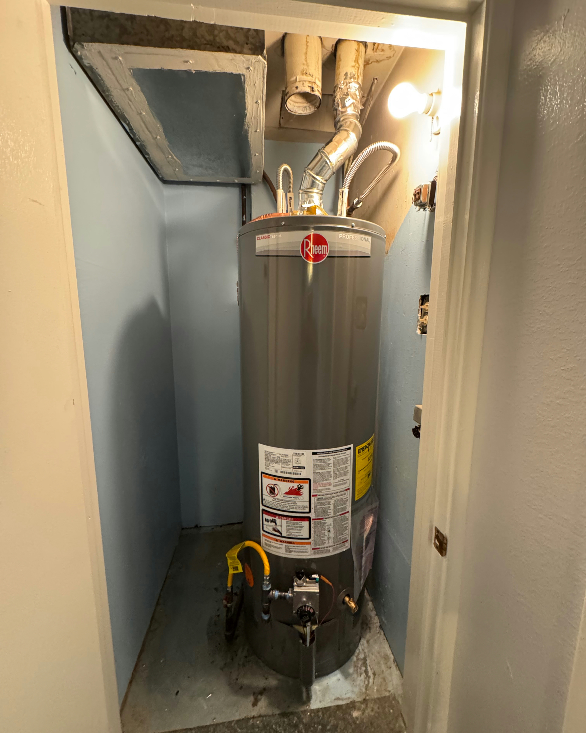 Water heater installed in a utility closet